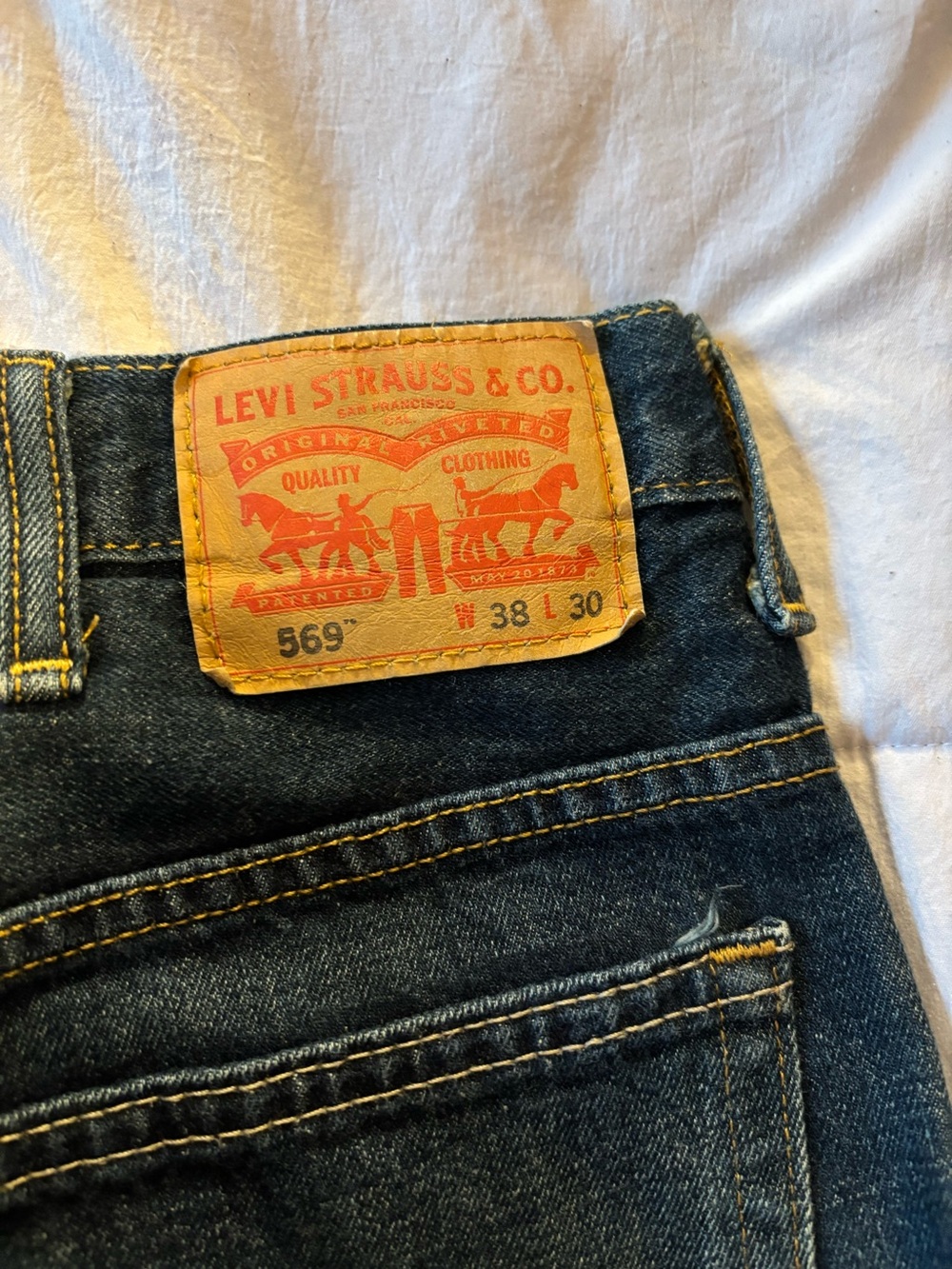 Levi's 569 Men's Relaxed Jeans in Dark Blue with Tan Patch